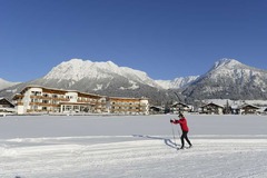 exterior view in winter, cross-country skier