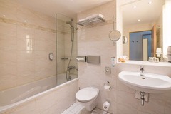 Bathroom with bathtub, standard room