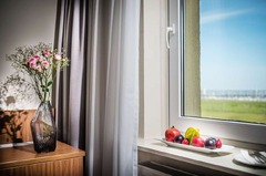fruit plate and view of a standard double room up 3. floor