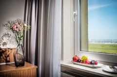 fruit plate and view of a standard double room up 3. floor