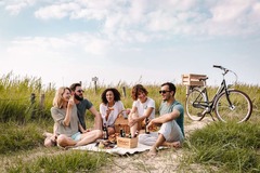 People picnicking on the dike