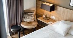 bed and arm chair, Komfort-Plus-double room single room