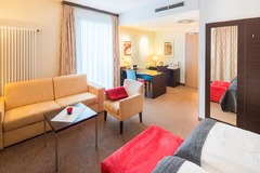 living room Juniorsuite, 2 single beds