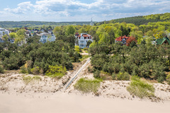 Pineblue Villas: Ostseeurlaub in bester Lage, im Park und am Meer.