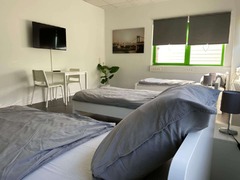 Beispielhaftes Schlafzimmer der Work&Stay GmbH.