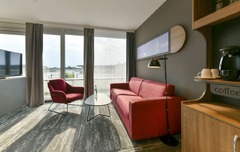 Superior Suite - living room and work space