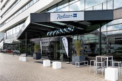 Radisson Blu Hotel Bonn – modern exterior view of the hotel near the Rhine River.